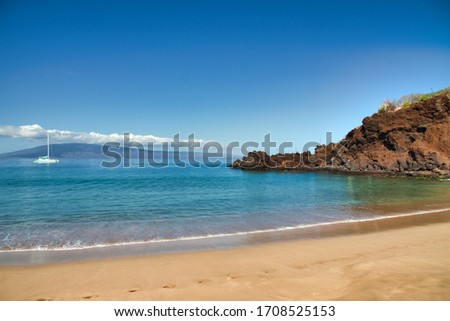 Bright sunny morning at Black Rock on Ka'anapali Beach on Maui. Royalty-Free Stock Photo #1708525153