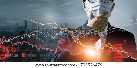 Economy crisis, Businessman with mask, Analysis corona virus economic impact, Crisis business and market financial conditions in the global Effects of outbreak and pandemic covid-19, Stocks fall.  Royalty-Free Stock Photo #1708526476