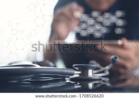Medicine doctor hand touching computer interface as medical online and network connection, health icons with modern virtual screen, medical technology network, telemedicine concept