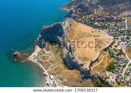 Genoese Fortress, Sudak, Russia. Sights of Crimea. Aerial drone photography. Royalty-Free Stock Photo #1708538317