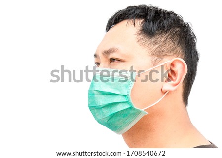 Asian middle age man Asia ethnic wearing health mask to prevent virus or flu or covid19 or coronavirus and white background copy space. Clipping path in the picture. 