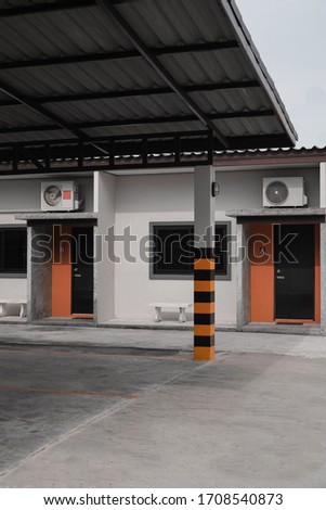 Urban minimalistic architecture with orange elements