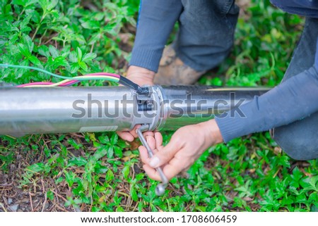 Submersible pumps drainage system dewater construction sites, solutions to groundwater problems using deep wells. Royalty-Free Stock Photo #1708606459