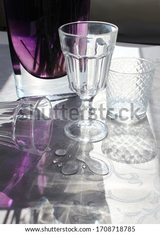 
table setting top view. glass glasses in the sunlight on the table. interior details.