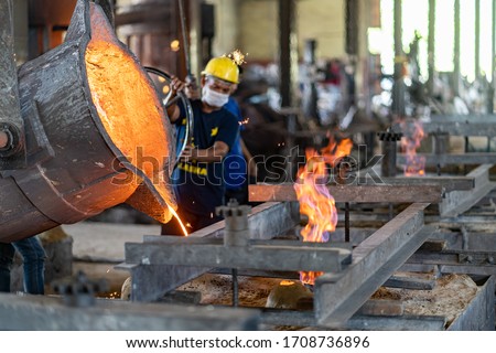 Casting  melting  molding and foundry. The most widely used non reusable mold method is sand casting a process in which specially treated sand is rammed around the pattern and placed in a support. Royalty-Free Stock Photo #1708736896