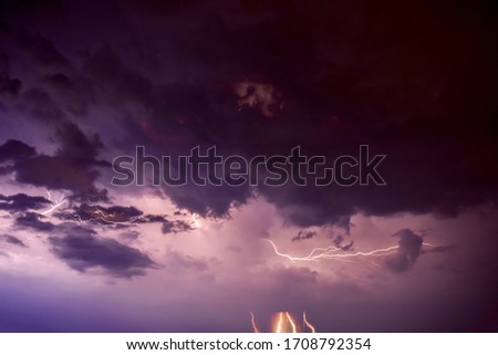 Montenegro. Powerful thunderstorm over the sea with continuous flashes of lightning. 