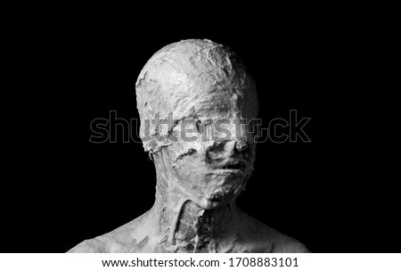 portrait of a shapeless distorted face on a black background