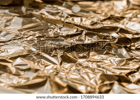 Abstract textured shiny foil background 
