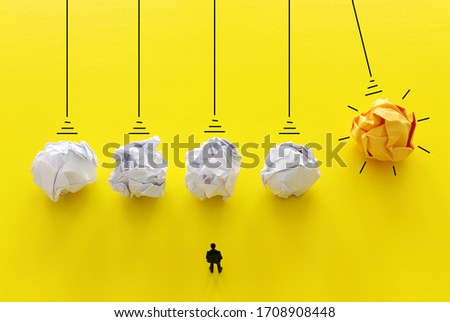 Education concept image. Creative idea and innovation. Crumpled paper as light bulb metaphor