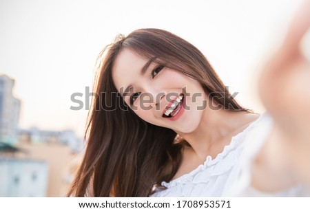 Portrait of young beautiful asian woman using smartphone selfie live. Happy asian girl online influencer blogger. Education online technology connected asia people, woman quarantine lifestyle concept