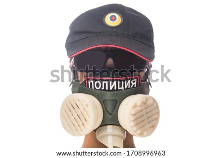 The head of a Russian policeman in a uniform cap and a futuristic green respirator with the emblem "Police" and a black glasses on a white background