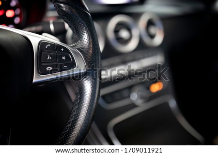 Car Steering wheel control buttons Royalty-Free Stock Photo #1709011921