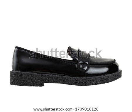 Beautiful children’s luxury leather black lackered shoe, side view, clipping path, mockup, isolated on white background Royalty-Free Stock Photo #1709018128