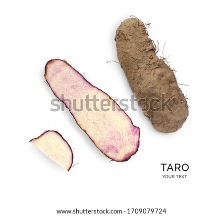 Creative layout made of taro on the white background. Flat lay. Macro  concept. Royalty-Free Stock Photo #1709079724