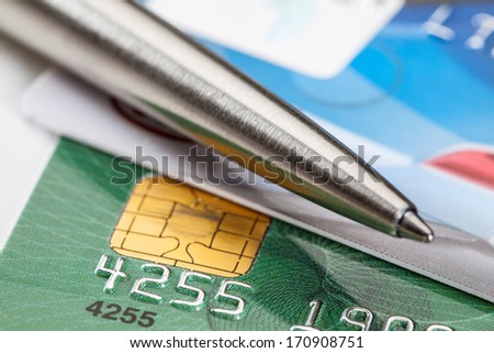 Credit cards and a pen - closeup shot