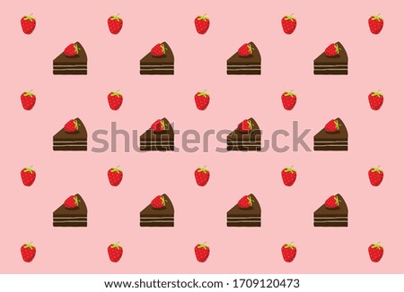 Chocolate cake slices topped with fresh strawberries
