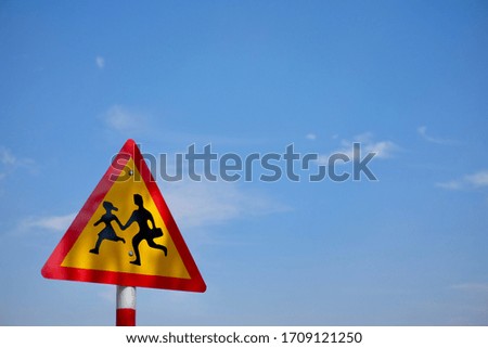 Triangle Sign Pedestrian Crossing with Sky Background