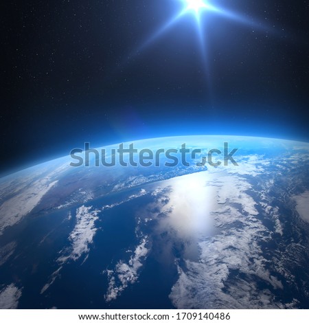 Planet Earth with a spectacular sunrise.Planet Earth and Sun rising, view from space. Elements of this image furnished by NASA. Royalty-Free Stock Photo #1709140486