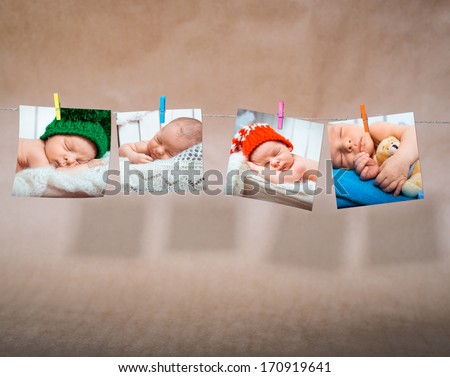 newborn photos attached clothespins on rope