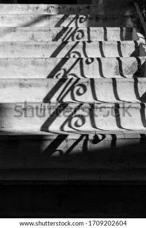 Stair steps and shadow handrail, black and white photography