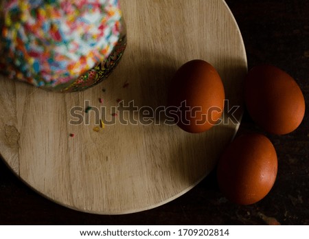 easter morning, easter cake and colored eggs, close-up