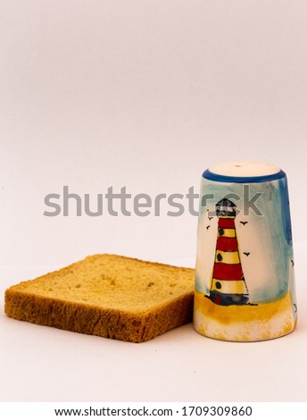 Salt and bread. Beautiful salt shaker with lighthouse picture. For welcome in Serbia. 
