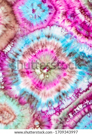 abstract bright ornament in tie-dye batik technique handpainted on silk head scarf Royalty-Free Stock Photo #1709343997