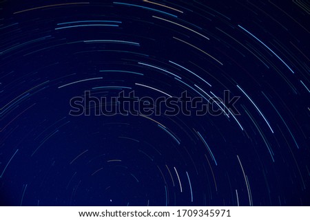 Star trails around the Plough, Big Dipper, constellation in the northern hemisphere