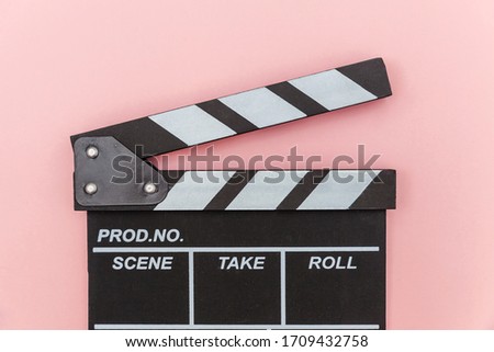 Filmmaker profession. Classic director empty film making clapperboard or movie slate isolated on pink background. Video production film cinema industry concept. Flat lay top view copy space mock up