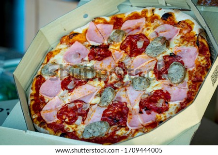 Margherita Parma Ham / Seafood / Beef Lover sausage Italian Pizza in open Pizzeria brown Box.