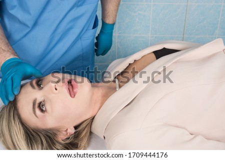 Coroner inspects the body of the crime victim (imitation)

