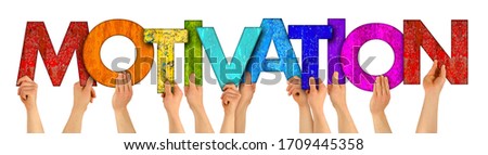 Volunteers people holding up colorful rainbow wooden letter with word MOTIVATION isolated on white background. Problem solution sport fitness success business concept.