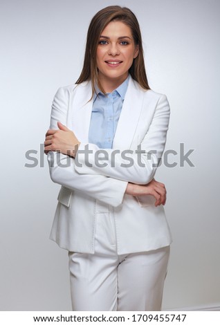 Fashion portrait of smiling business woman wearing white suit. isolated female portrait.