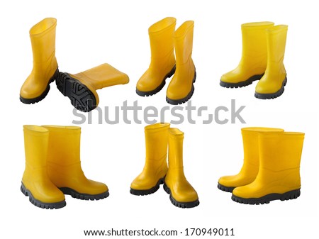 Set 6 pair of yellow gumboots isolated on white background Royalty-Free Stock Photo #170949011