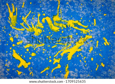 Abstract blue and yellow watercolor background. Hand Made Backdrop. Brush Image. Spots of paint. Fragment of artwork.