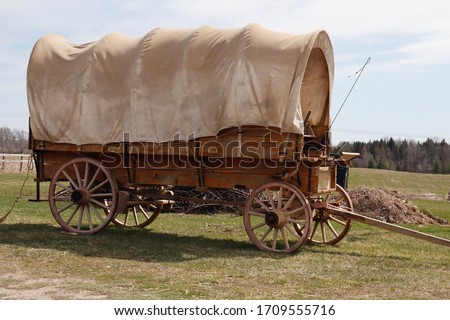 Antique covered wagon, chuck wagon Royalty-Free Stock Photo #1709555716