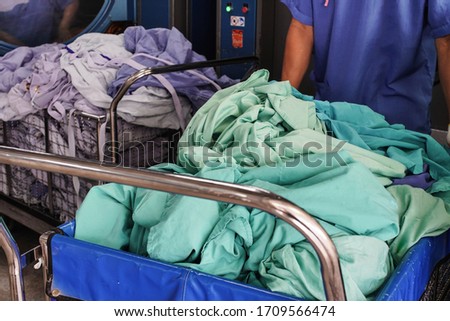 Used patient cloth prepare to go into the washing machine in the hospital.