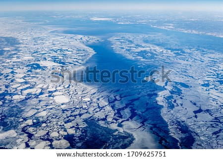 floating ice floe from above in arctic water