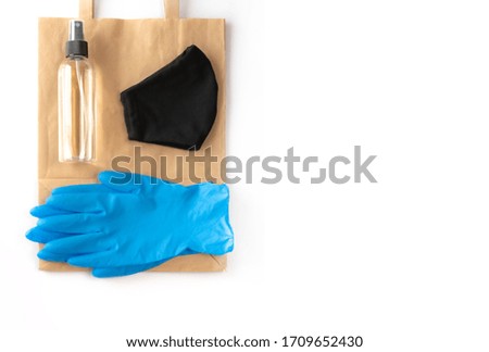 Covid-19. For safe shopping during an epidemic, you will need an antiseptic, gloves, and mask. White background, isolated.