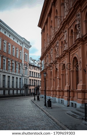 Beautiful Riga city architecture with old buildings and brick streets. Photo taken in Europe, Latvia, Riga.