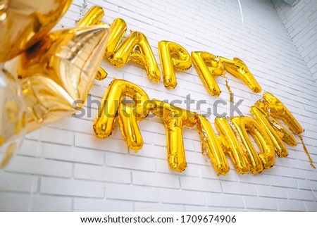 
inscription from balloons "happy birthday"