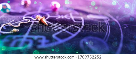 Esoteric Concept - Pendulum On Blurred Altar With Smoke And Bokeh
 Royalty-Free Stock Photo #1709752252
