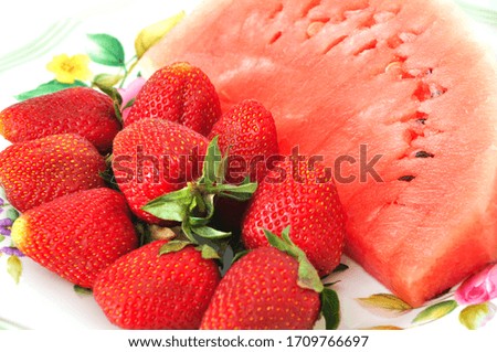 Great clean fresh refreshing strawberries and watermelon, in a plate