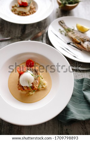 fish dishes on a gray background