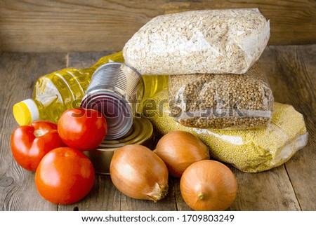 Stock of various products on a wooden background