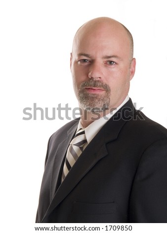 Stock photo of a well dressed confident businessman looking directly at the camera, isolated on white.