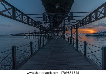 Dock-pier, is located on the river Odiel, in the city of Huelva, Spain. It is popularly known as the "Muelle de Riotinto" or "Muelle del Tinto" since it is part of the name of the concession company.