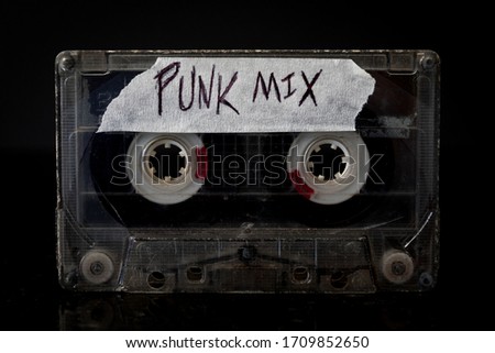 Punk Music Mixtape Cassette 
A Punk music mixtape on black background. Royalty-Free Stock Photo #1709852650