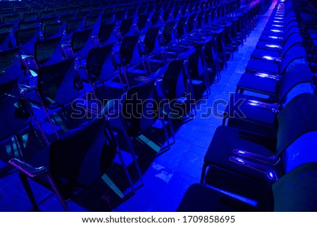 Blue chairs in the congress hall