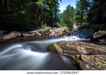 Water waves in mountain river, Orlicke mountains, Czech republic